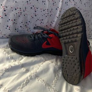 Nike Red and Black Athletic Shoes with Rugged Traction